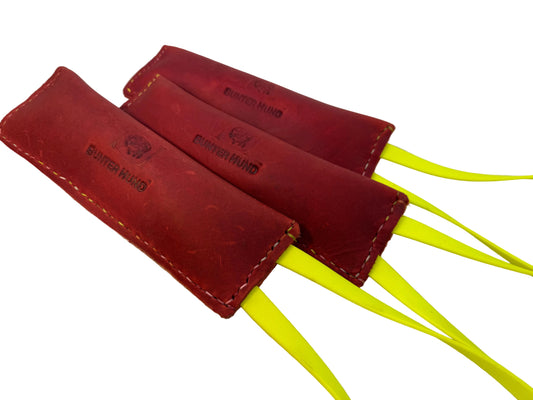 Leder Dummy Bringsel Apportel Fettleder Biothane schwimmend 250gr